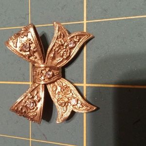 Ornate Gold Tone Bow Brooch with Crystals